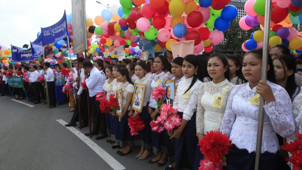 Cambodian civil servants participate in the Independence Day celebrations in Phnom Penh, Cambodia, last week. 