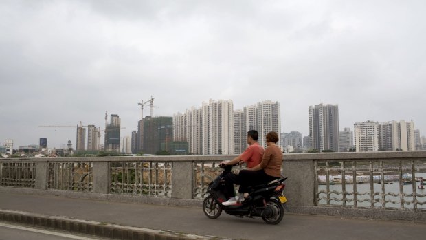 Haikou, the capital of tropical Hainan island - China's Honolulu - tops the table for credit expansion as investors from outside pile into property there.