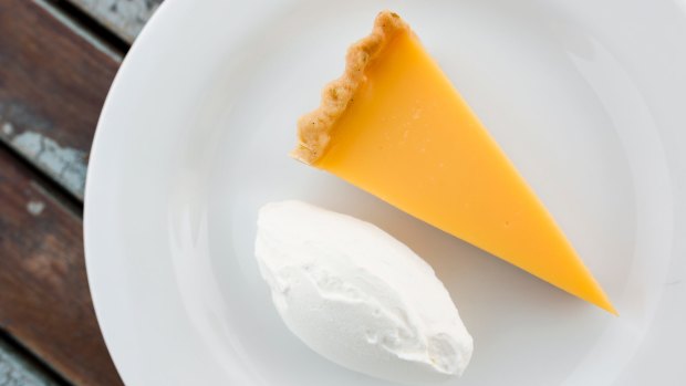 Zingy tang with crisp pastry: Lemon tart with fresh cream. 