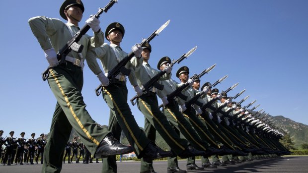 Chinese troops practice marching, ahead of a the military parade, at a camp on the outskirts of Beijing.