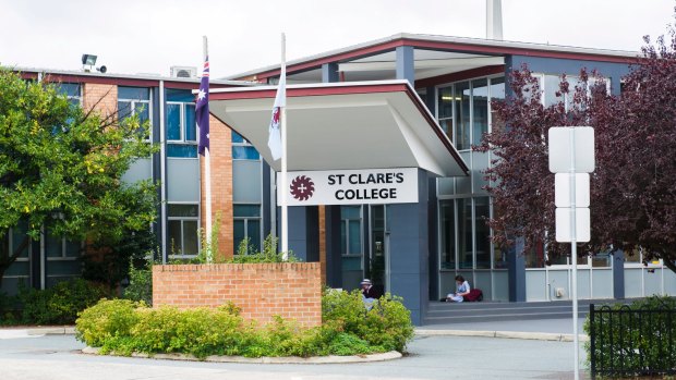 St Clare's College is reviewing its internet security after its website was hacked to display Arabic messages over the weekend.