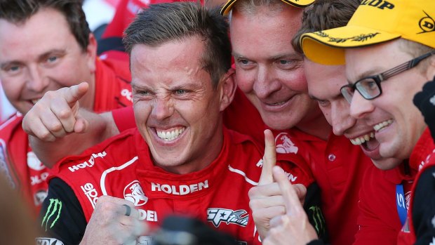 Jack Perkins and James Courtney celebrate that winning feeling at the GC600 on the Gold Coast.