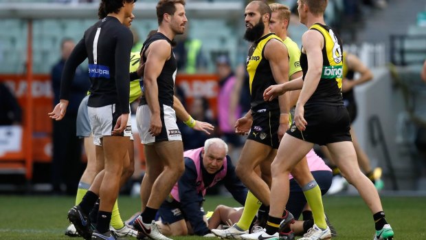 Jed Lamb on the ground after being struck by Bachar Houli.