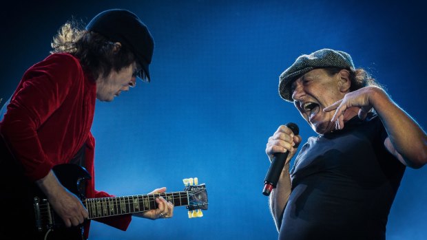 Guitarist Angus Young and Singer Brian Johnson  of AC/DC perform on stage during the legendary Australian rock band's 'Rock or Bust' World Tour at Etihad Stadium in Melbourne.