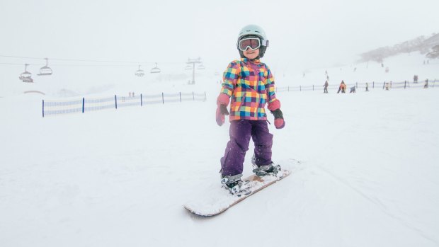 Poppy Hammer, 3, enjoys the snow at Perisher on Wednesday.
