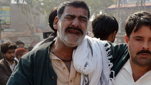 A Pakistani Shiite Muslim mourns the killing of his community members.