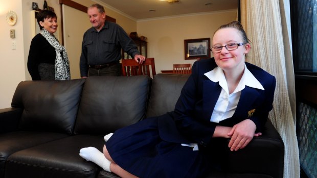 Rhonda and Michael Faragher of Ainslie and their daughter Ruth,18 who has Down Syndrome.
