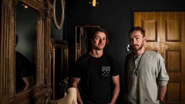 Michael Wilkinson, and Mitch Young in one of their escape rooms.