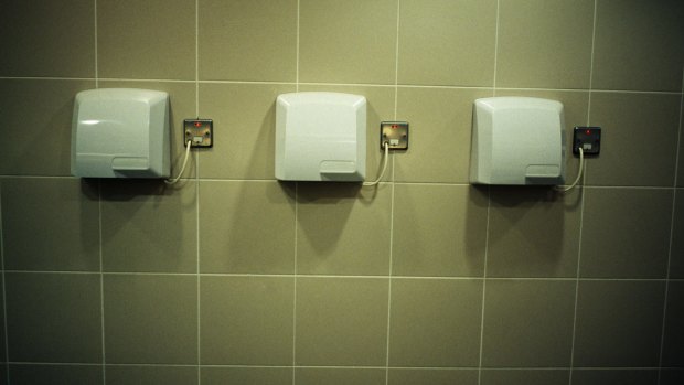 Sharing the germs: A new study has found electronic hand dryers spread more bacteria through the air than paper towels.