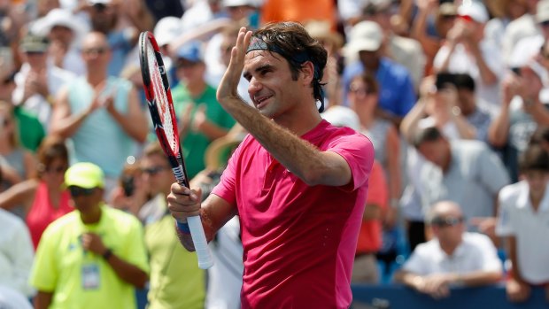 Roger Federer salutes the crowd.