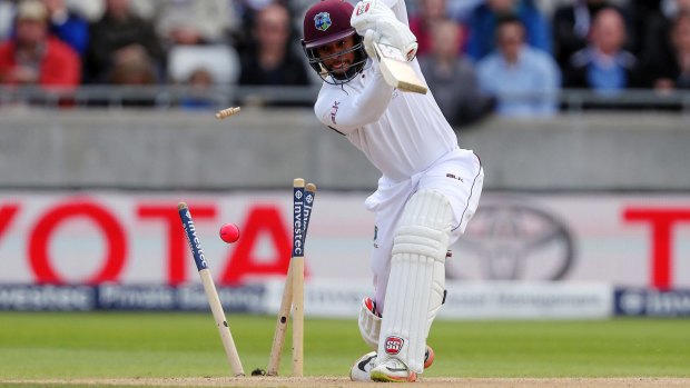 West Indies Shai Hope is bowled by England's Toby Roland-Jones.