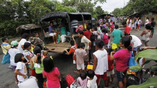 Running from Mayon: Residents evacuate their homes in Albay province.