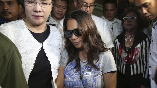 Maria Kristina Sergio, centre, who allegedly recruited Mary Jane Veloso to smuggle heroin.