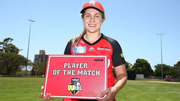 Molineux poses with the player of the match award.