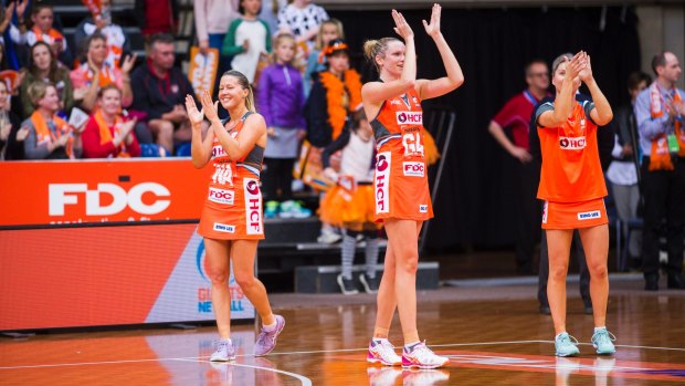 Giants Netball players celebrate beating the Melbourne Vixen at AIS Arena this year.