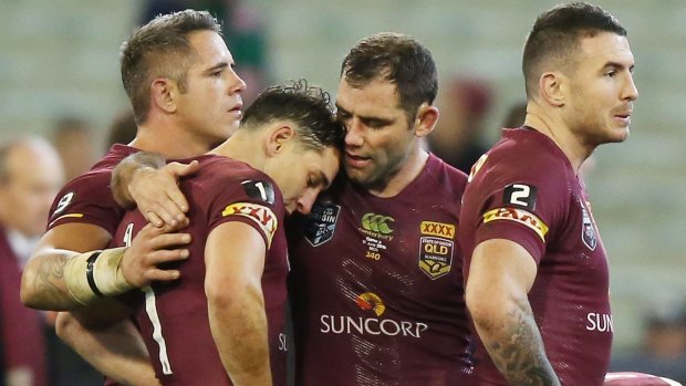 There, there: Cameron Smith consoles Billy Slater after the Maroons' defeat in Origin II. 