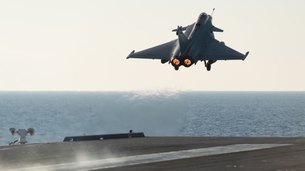 A French army Rafale fighter jet taking off from the deck of France's aircraft carrier Charles De Gaulle last year. French jets bombed Islamic State targets in the Iraqi cities of Ramadi and Mosul. 