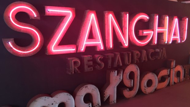 On a restaurant sign - Szanghaj is spelt out in capital letters almost a metre high.