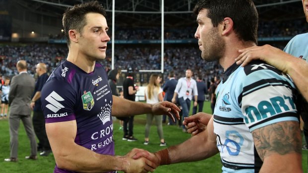 Respect: Cooper Cronk and Michael Ennis shake hands.