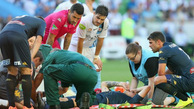 Injury blow:  Storm Roux of the Mariners stretchered off with a suspected broken leg.