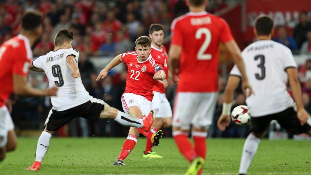 Ben Woodburn scores for Wales.