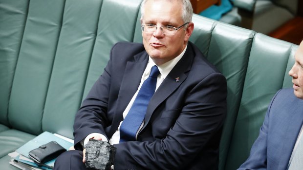 Scott Morrison with his pet coal in Parliament.