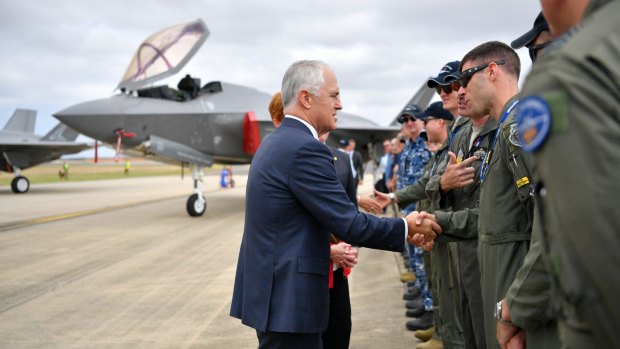 Prime Minister Malcolm Turnbull with Australia's newest warplane, the F-35 Joint Strike Fighter at the Australian international Air Show at Avalon earlier this year.