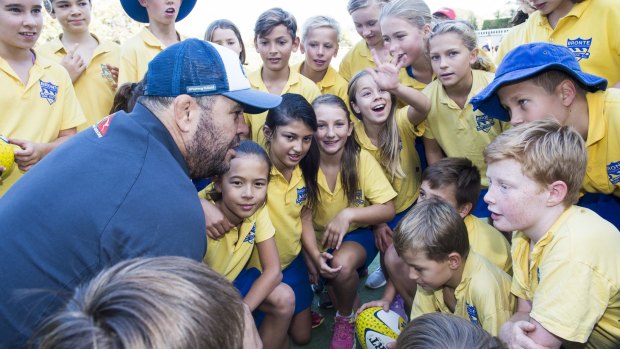 Wallabies coach Michael Cheika with students at a Game On workshop at Bronte Public School. 
