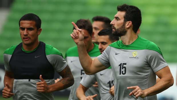 Making a point: Jedinak trains with his teammates before the big game.