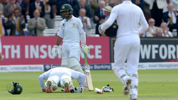 Pakistan's Misbah-Ul-Haq does push-ups to celebrate scoring 100 not out.