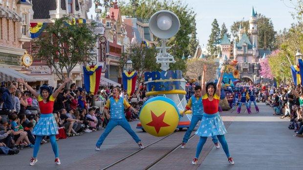 Pixar's famous lamp appears in the parade.