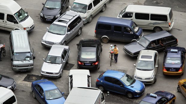 Enormous traffic jams in China's largest cities can make driving a less-than-romantic experience.
