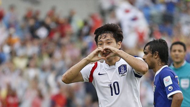 South Korea's Nam Tae-hee celebrates his goal against Kuwait at Canberra Stadium.