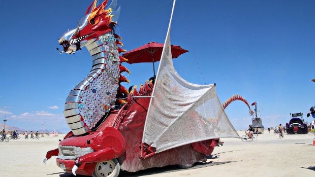 A dragon art car during the annual Burning Man festival in the desert.