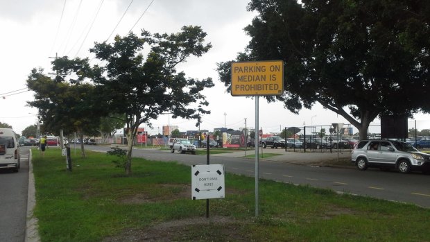 Dozens of drivers were fined for parking on this median strip in 2014. The council later put up No Parking signs.