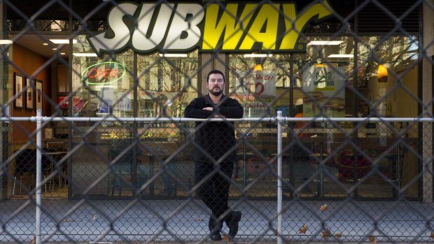 Businessman Tony Prior is fighting with developer Morris Property Group after a road was put in front of his Subway business, costing him a big percentage of his trade.
