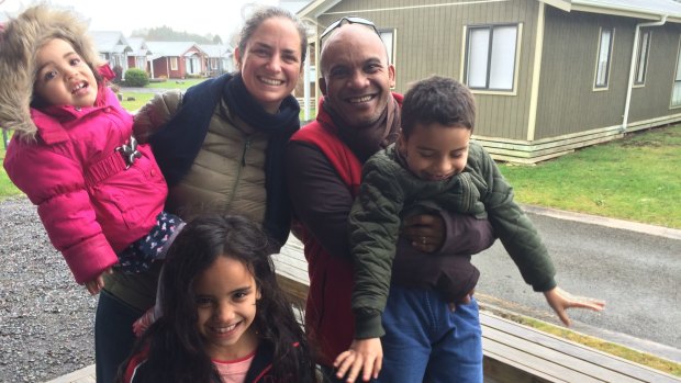 Reunited: Former Nauru opposition MP Roland Kun with his Australian wife Katy Le Roy and their three children.