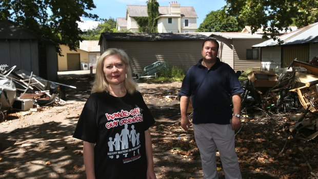 Local historian Terry Smith and activist Inara Molinari stand on the site planned for a six-storey apartment block.