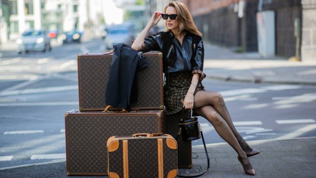 Fashion blogger Alexandra Lapp with her Louis Vuitton suitcases.