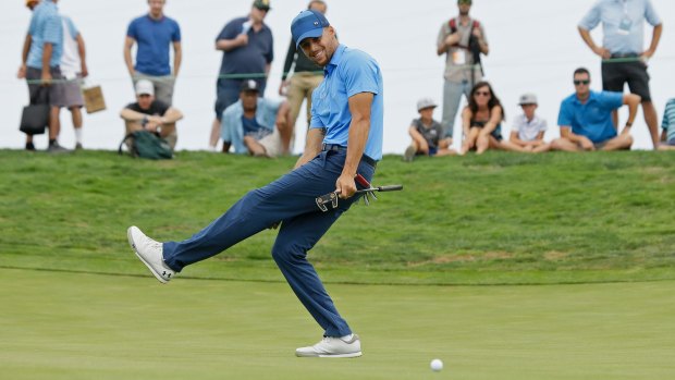Proving the doubters wrong: Stephen Curry reacts after missing a birdie putt but performed well in his pro golf debut.