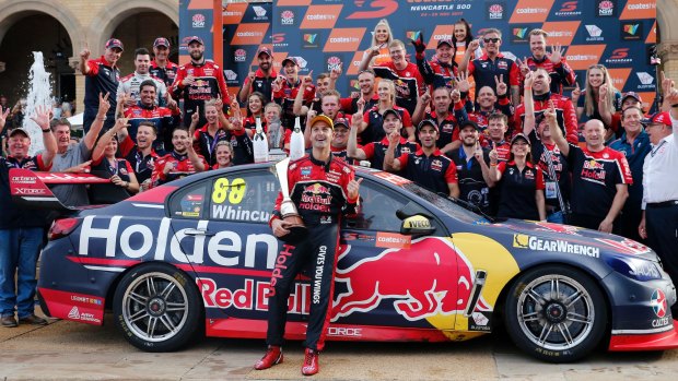 Dream team: Jamie Whincup celebrates winning race 26 and a record seventh Supercars championship.
