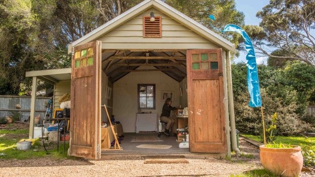 Victorian artist Maggi Jean works in her shed in Anglesea.