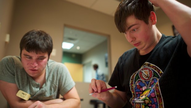 Brendan Cason, right, works on engineering homework with Ian Zaleski, a tutor and mentor with the Kelly Autism Program at Western Kentucky University.