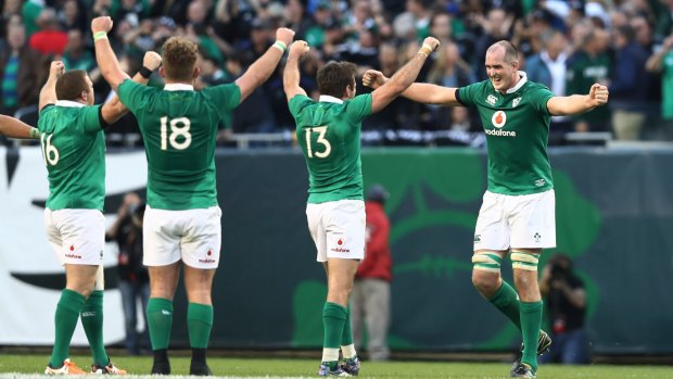 Deniers-in-chief: Ireland players celebrate their historic win over the All Blacks that ended their 18-match winning streak.