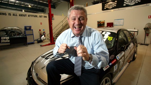 Craig Gore in happier times with one of WPS Racing's V8 cars. 