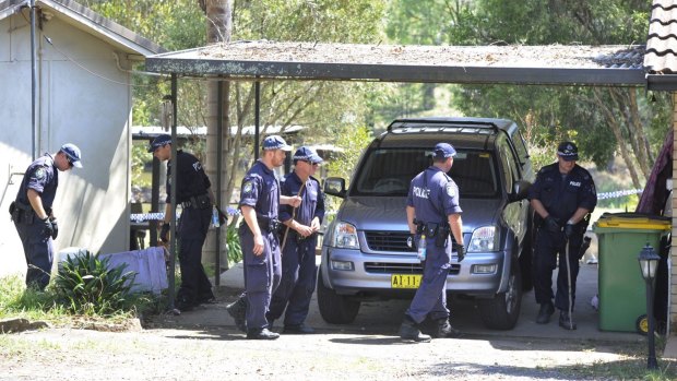 Police conduct a search of the property in Oakville, north-west Sydney, where Inspector Bryson Anderson was fatally stabbed in December 2012.