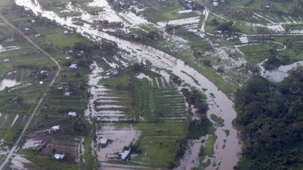 An aerial view from the Royal Austalian Air Force C-17A Globemaster aircraft revealing widespread floods in Fiji caused by Tropical Cyclone Winston. 