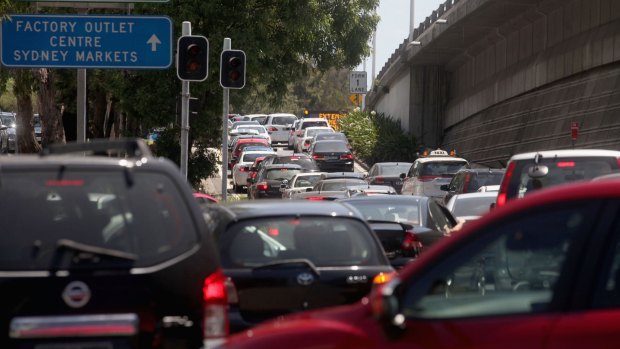 High volumes of traffic from Flemington Markets, a factory outlet and Olympic Park make the spot where Homebush Bay Drive connects with the M4 motorway a nightmare for motorists.