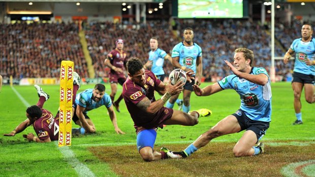 Dane Gagai scores a try for the Maroons.