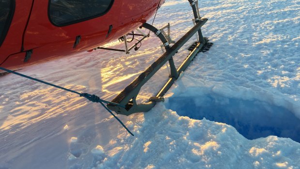 The crevasse into which David Wood fell on January 11, 2016, left of his helicopter. This photograph was taken on that day.